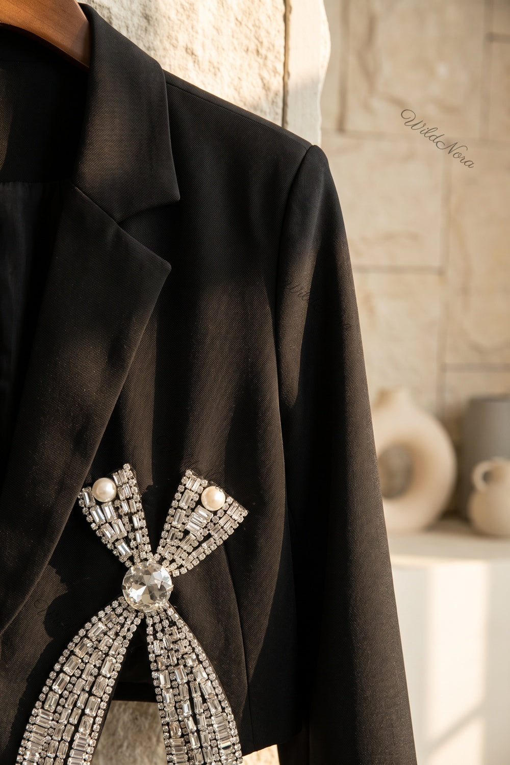 Black Woven Structured Cropped Blazer with Rhinestone Bow Embellishments black woven suiting fabric cropped blazer - product view 7