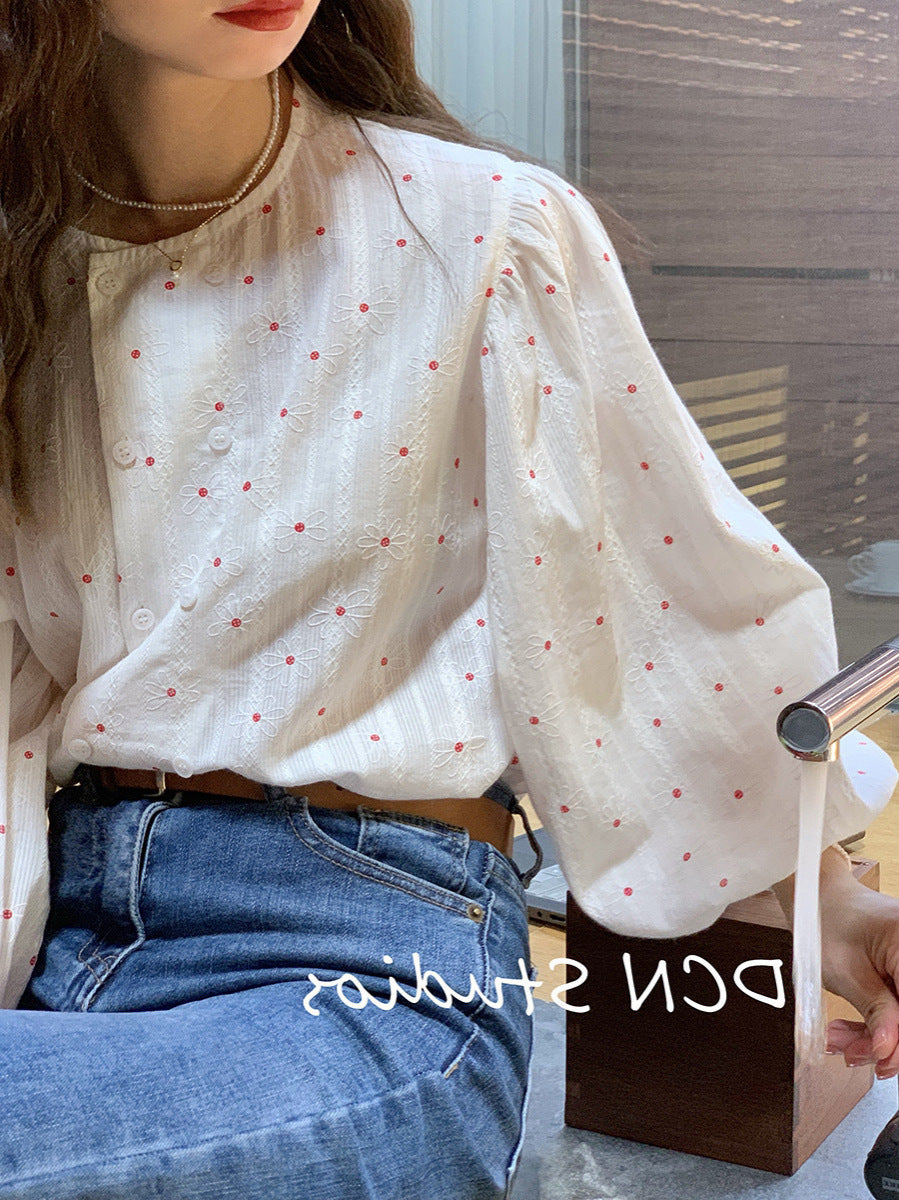 Double-breasted shirt with subtle floral pattern