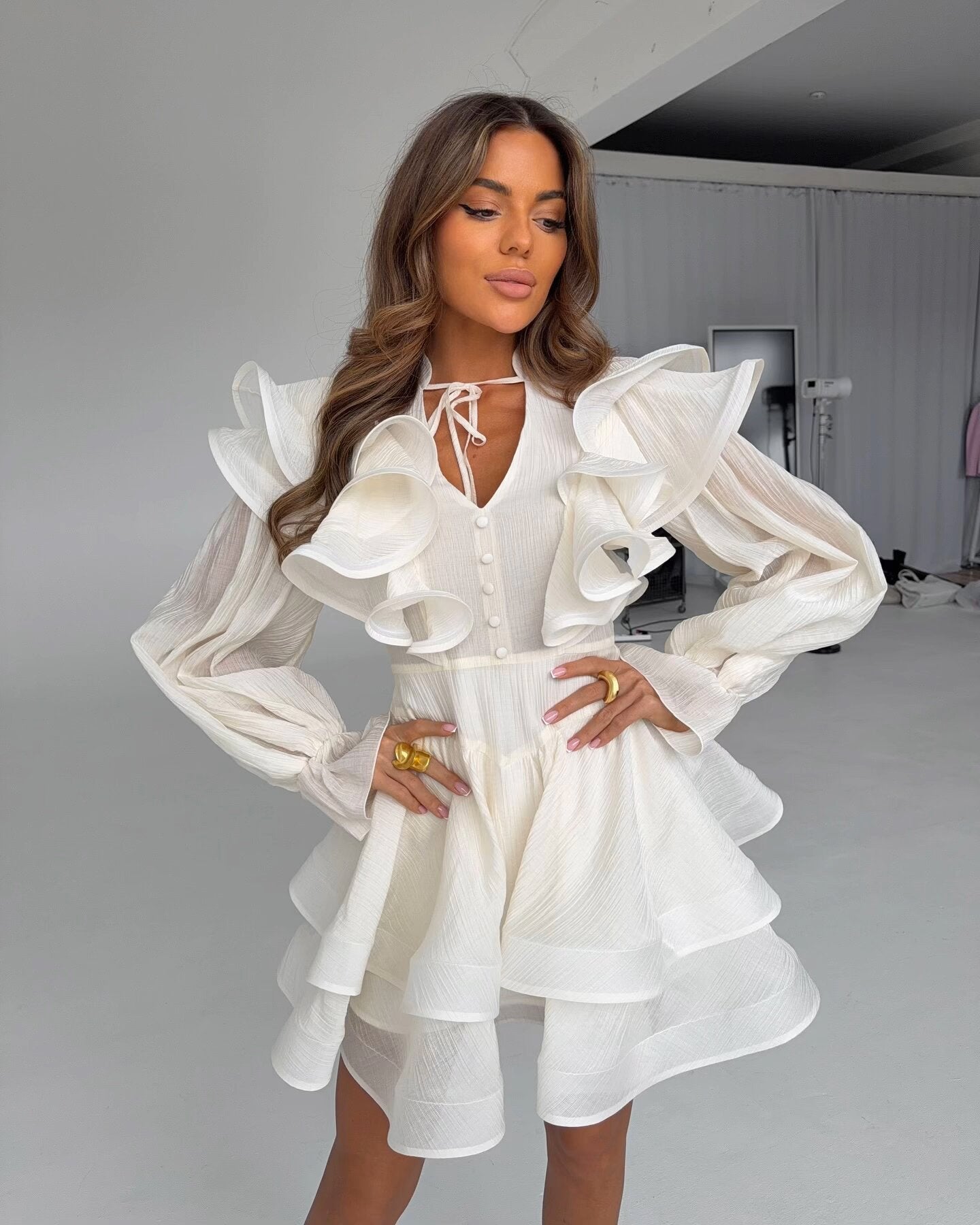 Bell-sleeve ruffled mini dress with tie detail