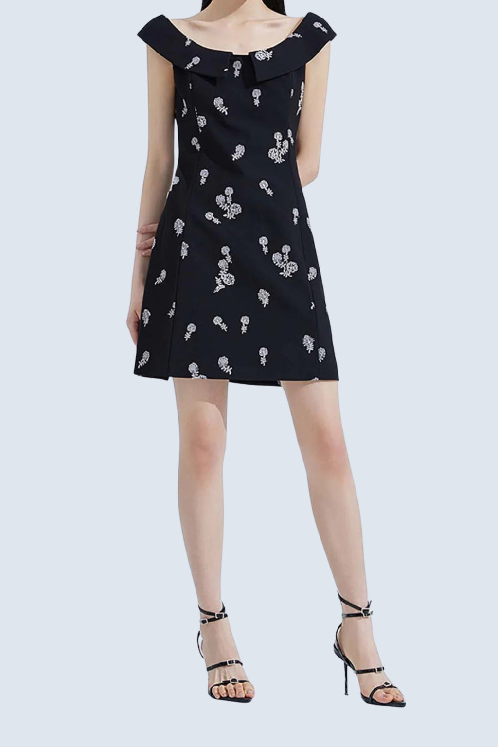 SLEEVELESS EMBROIDERED MINI DRESS IN BLACK