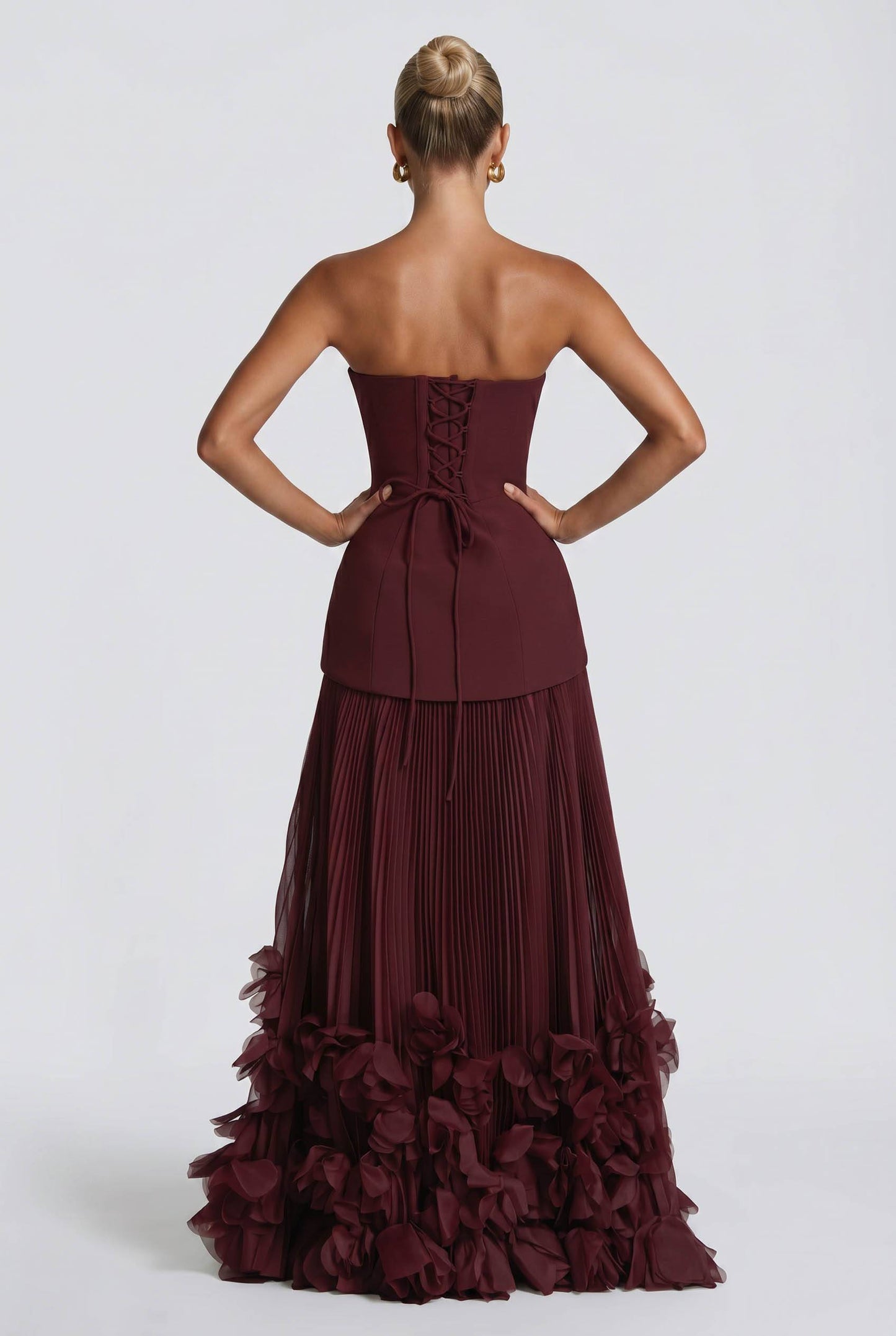 Strapless Burgundy Pleated Maxi Gown With 3D Floral Ruffle Hem