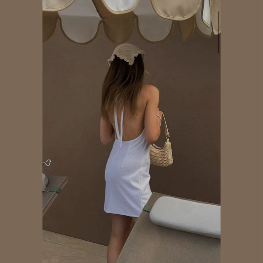 white halterneck open back A-line dress