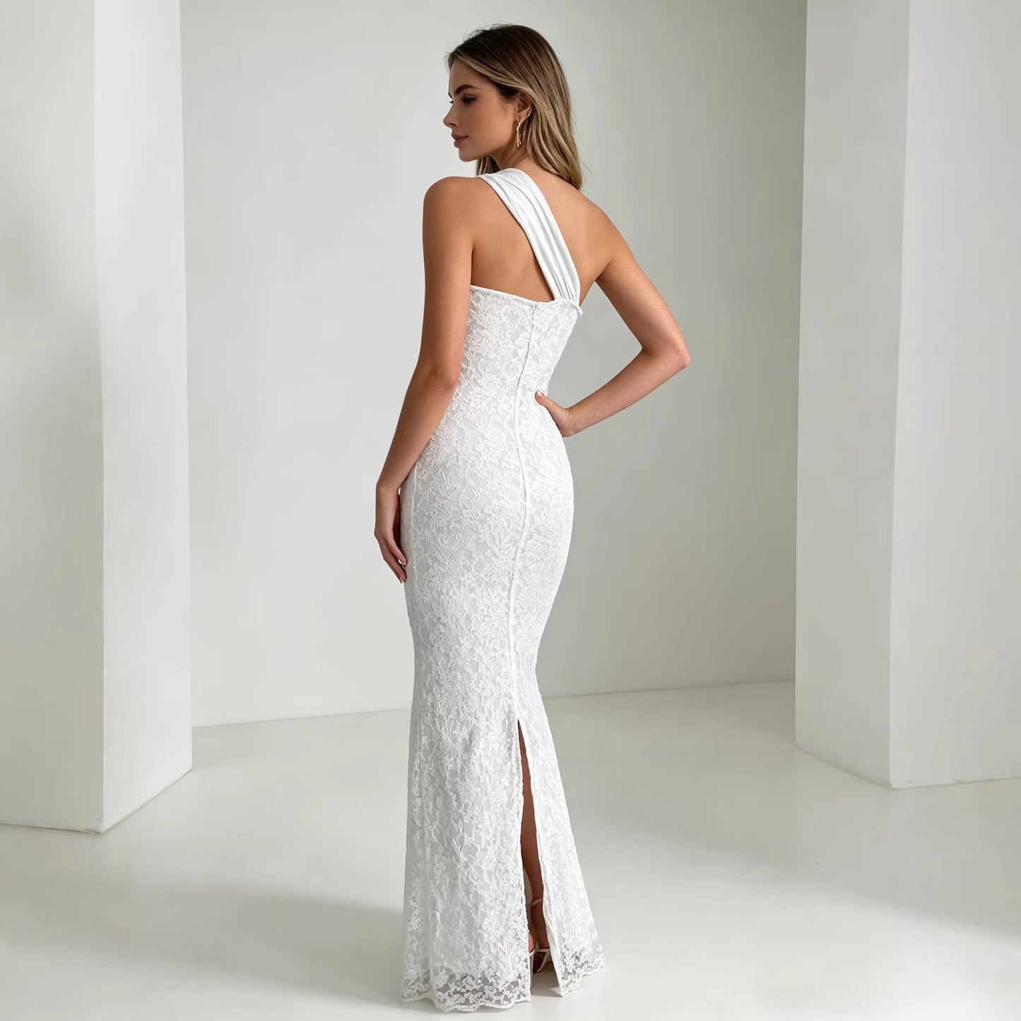white slanted shoulder strap lace dress