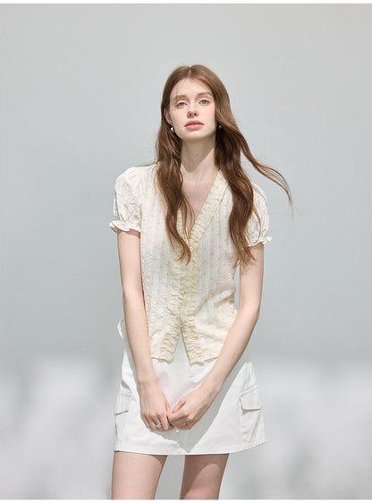 V-neck floral print shirt with ruffled trim and puff sleeves