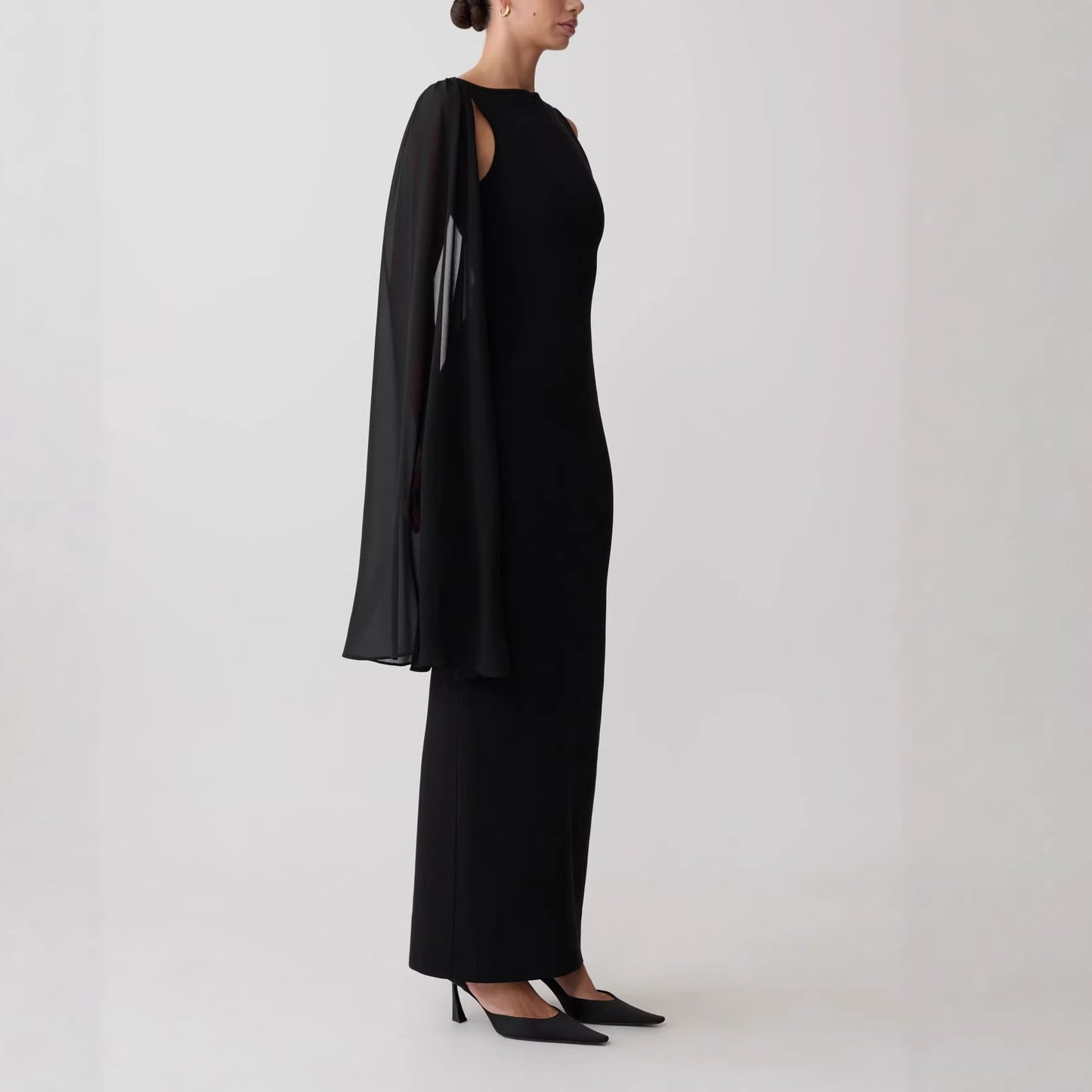 black one-shoulder streamer hip-hugging dress