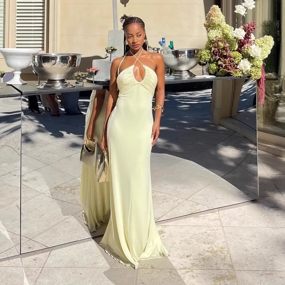 yellow halterneck open back slip dress