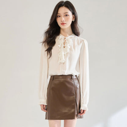 White ruffled tie-waist V-neck puff sleeve shirt