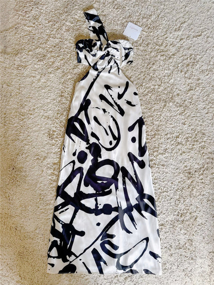 black and white contrasting abstract pattern side slit waistless dress