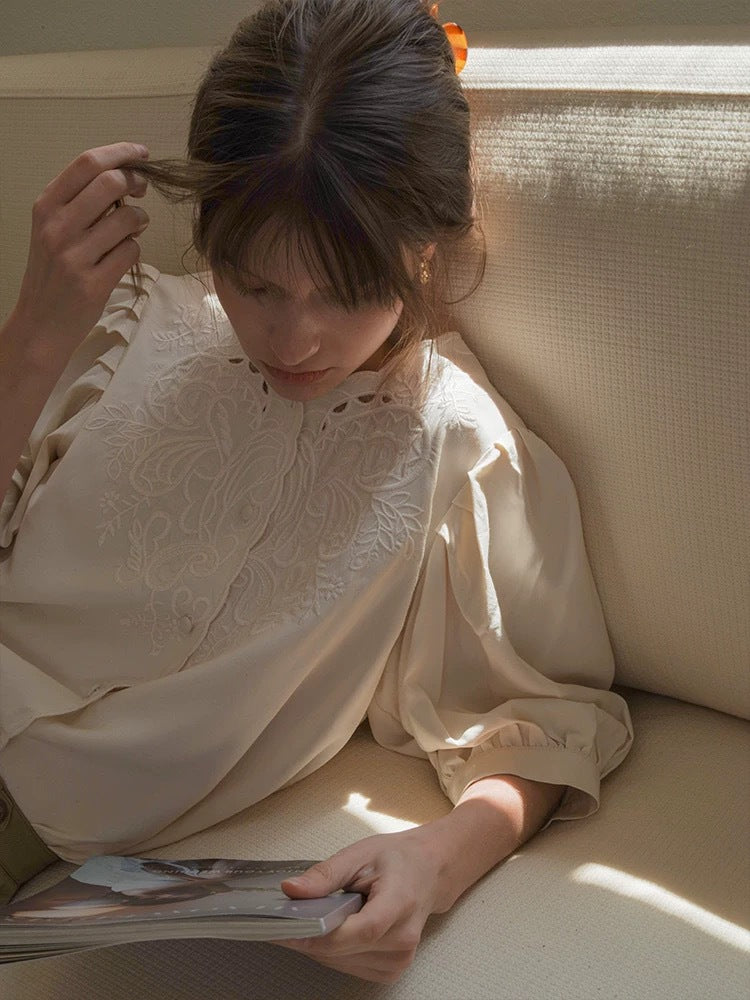 white embroidered cut-out  crew neck lantern sleeve shirt