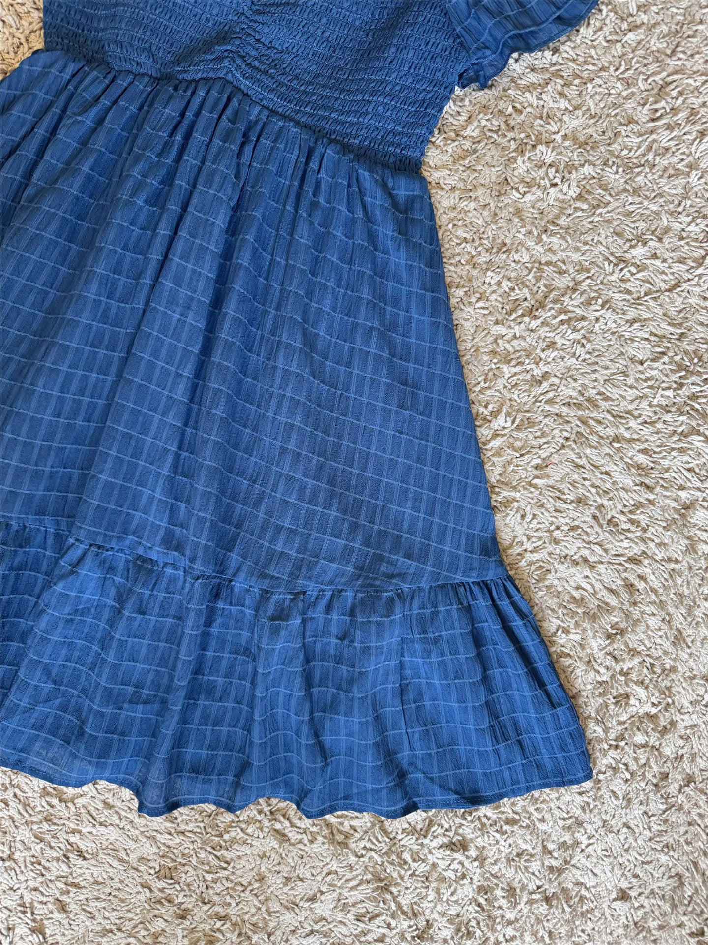 blue sleeveless V-neck mini dress