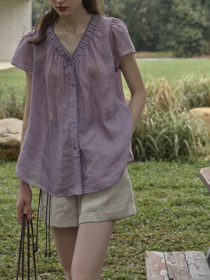 purple short-sleeve V-neck shirt