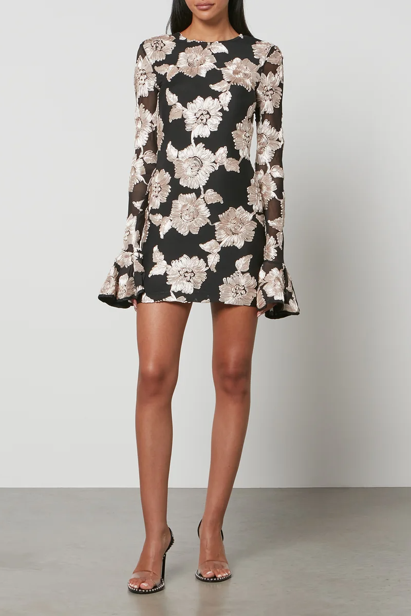  a floral dress with long sleeves 